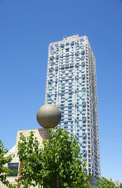 Tower with ball sculpture.