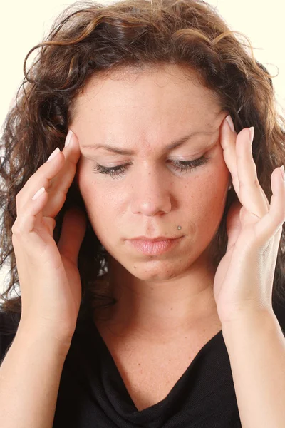 stock image Young woman has headache