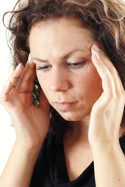 stock image Young woman has headache