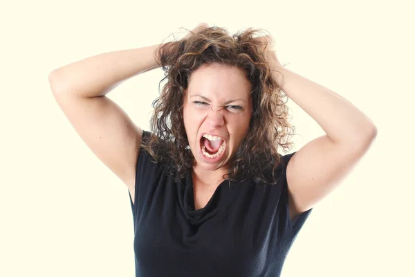 stock image Young woman is furious about her hair