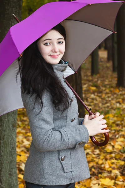 stock image Young woman in autumn park