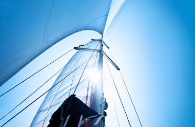 Sail over blue sky clipart