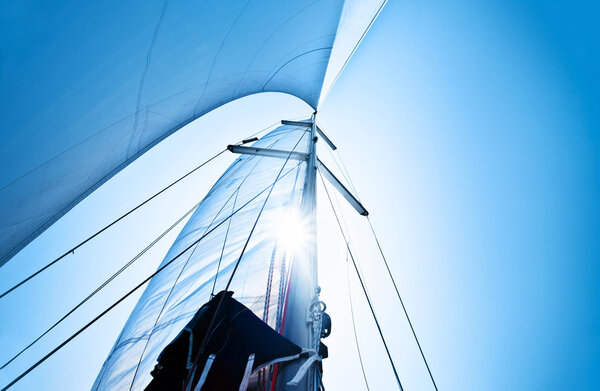 Sail over blue sky