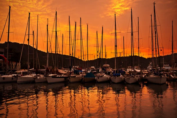 Yacht port over orange sunset — Stock Photo, Image