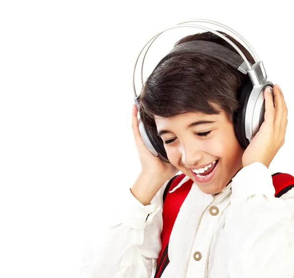 Bonito menino adolescente curtindo música — Fotografia de Stock