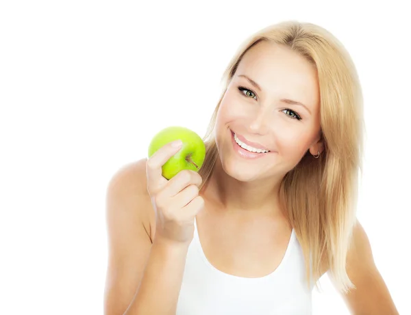 Красивая девушка ест яблоко — стоковое фото
