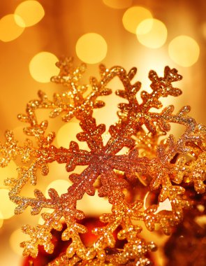 Golden snowflake Christmas tree decorations clipart