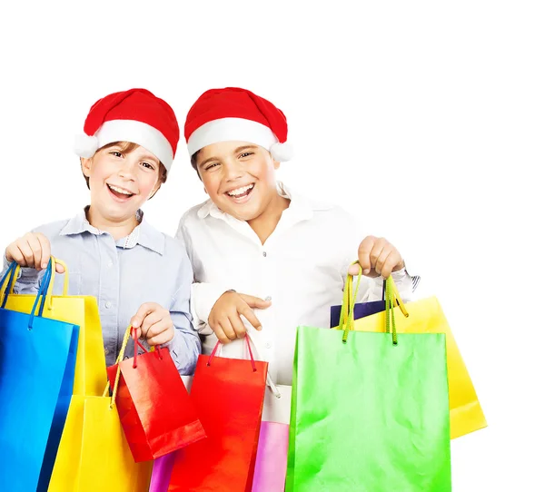 Счастливые Санта-мальчики с подарками — стоковое фото
