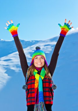 Happy cute girl playing in snow outdoor, Christmas winter holida clipart