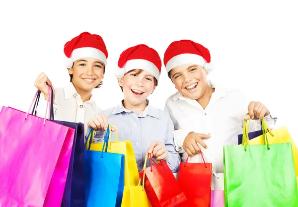 Feliz Papai Noel meninos com presentes — Fotografia de Stock