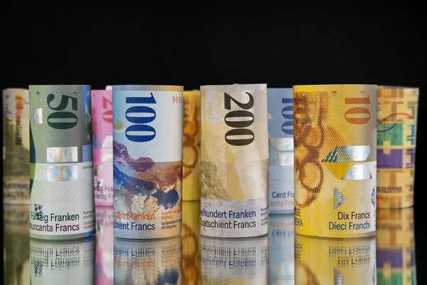 Swiss franc rolls — Stock Photo, Image
