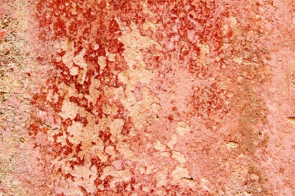 Aged weathered painted wall in red grunge tones — Stock Photo, Image