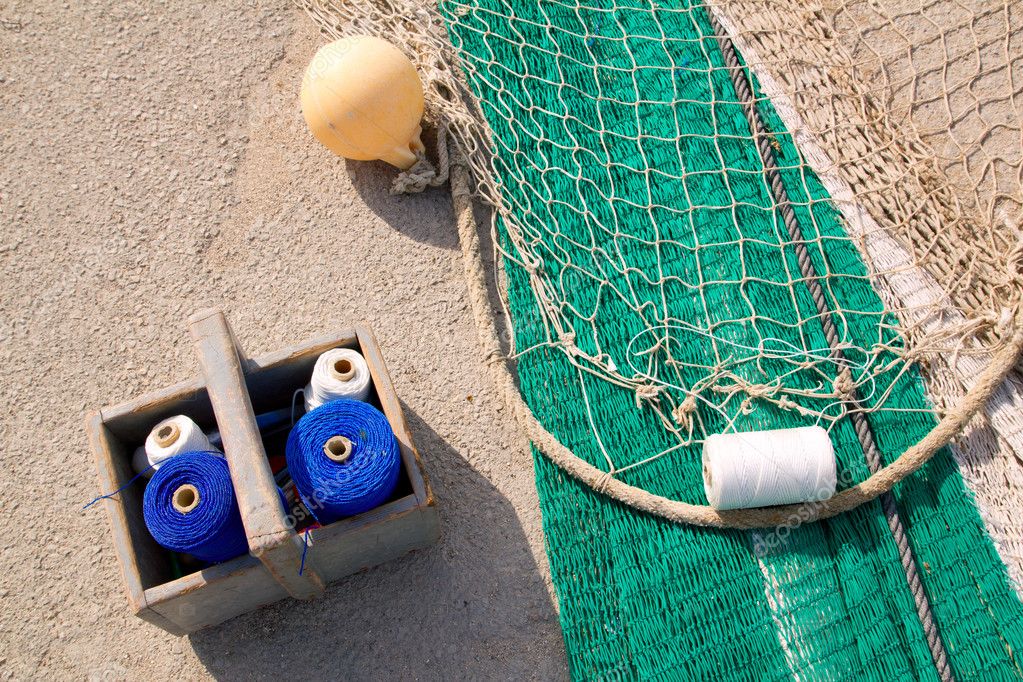 Fishing net repair kit with sewing thread spool — Stock Photo © lunamarina  #6819075