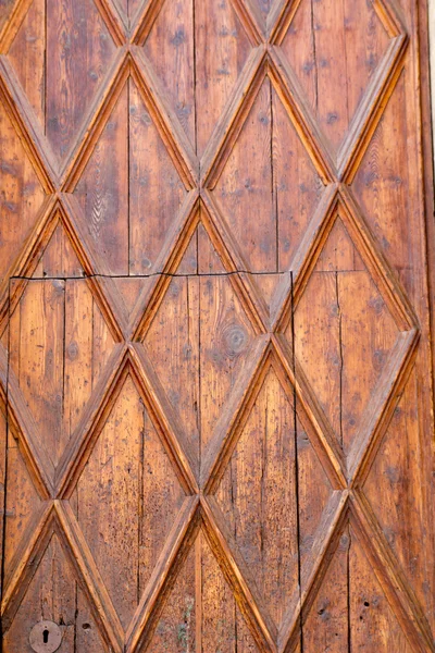 Ve věku zlatý dřevěné dveře od lonja of palma de Mallorca — Stock fotografie