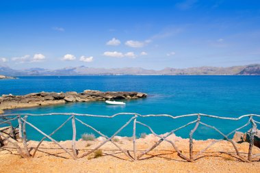 Alcudia in Mallorca la Victoria turquoise beach clipart