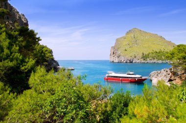 Escorca Sacalobra beach in north Mallorca with boat clipart