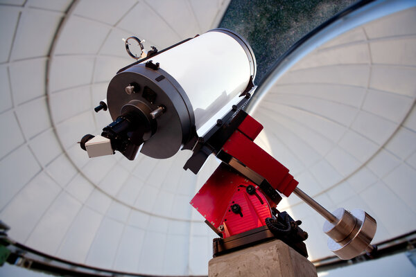Astronomical observatory telescope indoor night