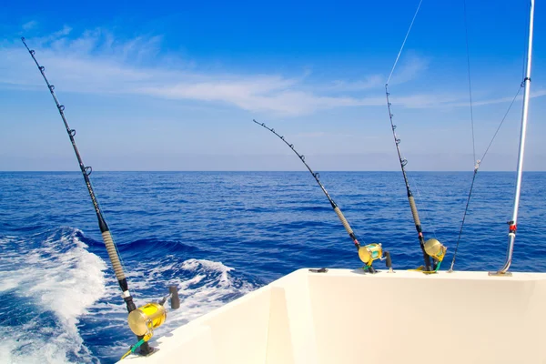 Boat fishing trolling in deep blue sea — Stock Photo, Image