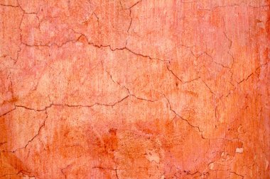 Grunge wall cracked texture in orange clipart