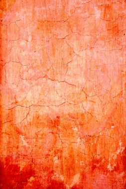 Grunge wall cracked texture in orange clipart