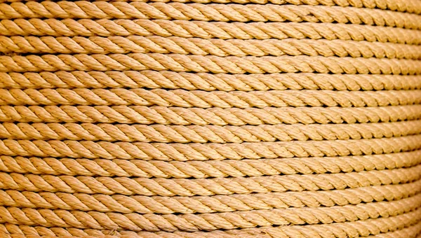 Brown rope in big round reel — Stock Photo, Image