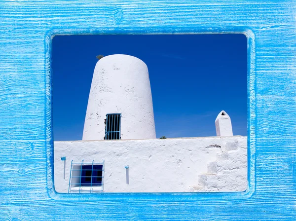 Blue wood frame with Formentera windmill — Stock Photo, Image