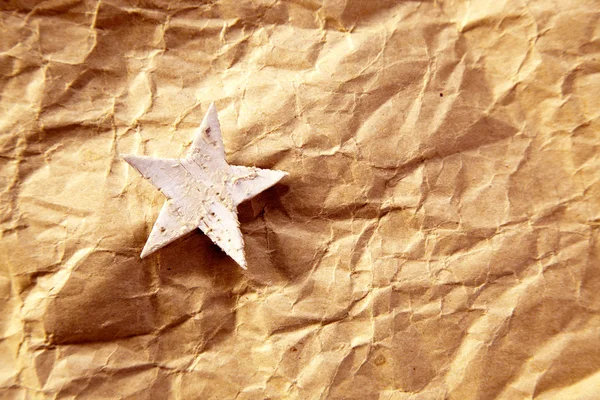 Christmas star background on recycle paper — Stock Photo, Image