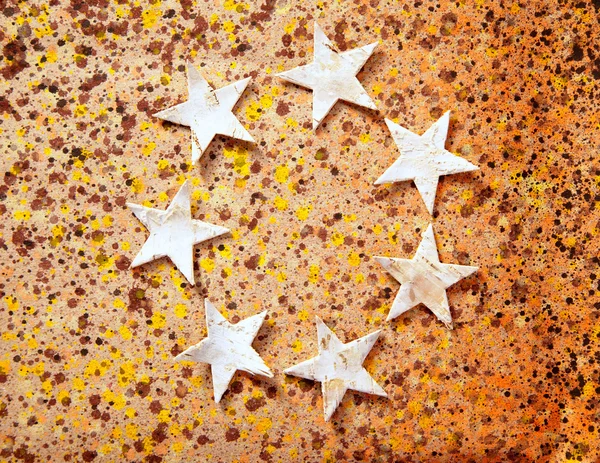 Estrelas de Natal fundo em papel reciclado — Fotografia de Stock