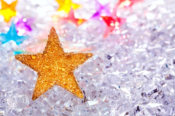 Christmas stars in ice background — Stock Photo, Image