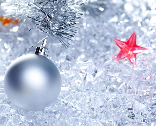 Christmas baubles silver on winter ice — Stock Photo, Image