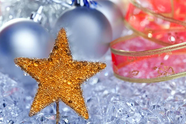 Vánoční zlaté hvězdy symbol stříbrné ozdoby — Stock fotografie