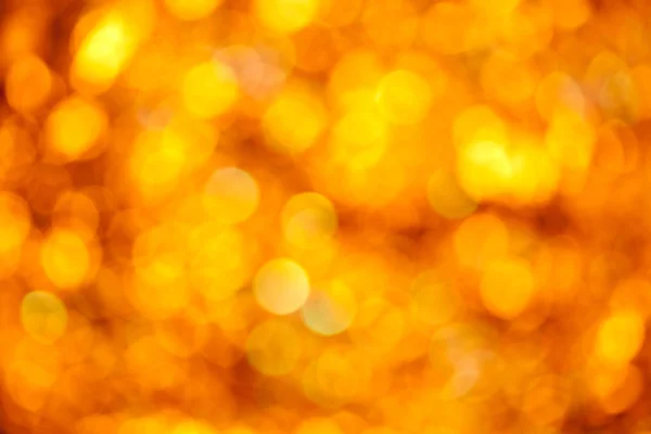 抽象金色模糊的灯背景 — 图库照片