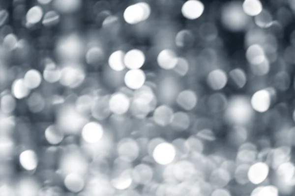 Abstrato desfocado borrão prata luzes de Natal — Fotografia de Stock