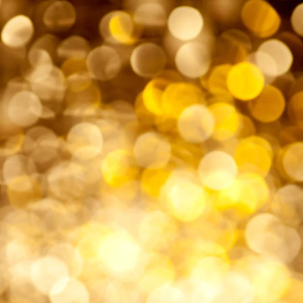 Abstrato dourado luzes embaçadas fundo — Fotografia de Stock