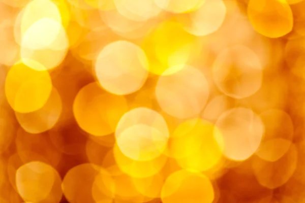 Abstrakt gyllene suddig ljus bakgrund — Stockfoto