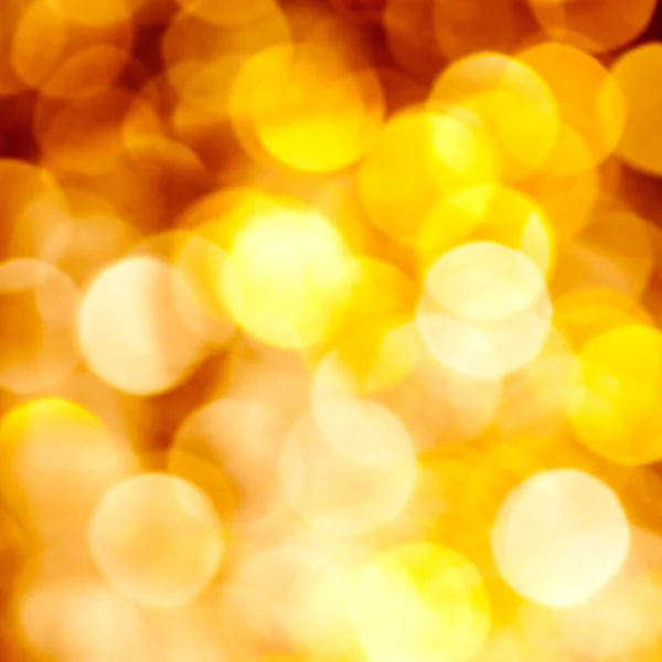 Abstract golden blurred lights background — Stock Photo, Image
