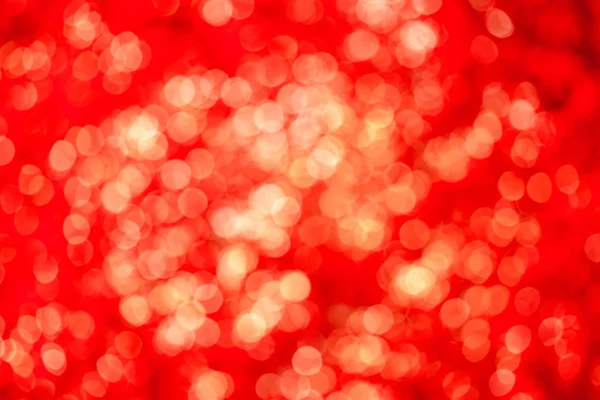 Абстрактные размытые красные рождественские огни — стоковое фото