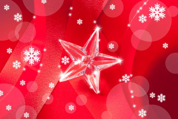 Jul glas stjärna på rött band — Stockfoto