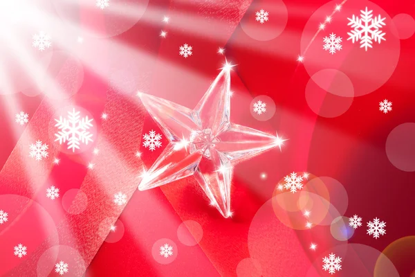 Jul glas stjärna på rött band — Stockfoto