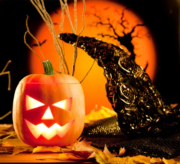 Halloween orange pumpkin on autumn leaves Royalty Free Stock Images