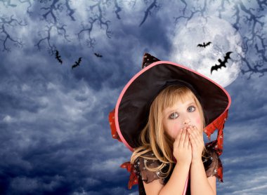 Halloween scared kid girl on dark moon sky clipart