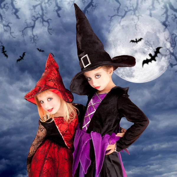 Halloween costumes kid girls on moon night — Stock Photo, Image