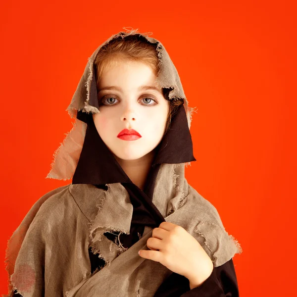 Halloween kid meisje kostuum op oranje — Stockfoto
