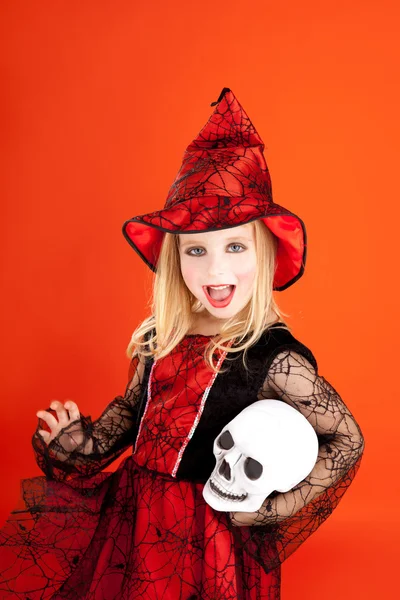 Halloween kid girl costume on orange — Stock Photo, Image