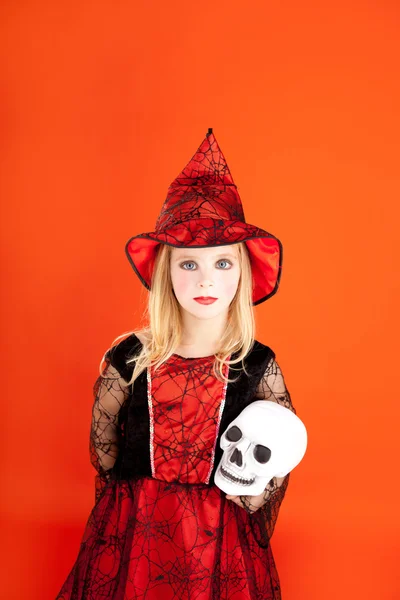 Halloween enfant fille costume sur orange — Photo