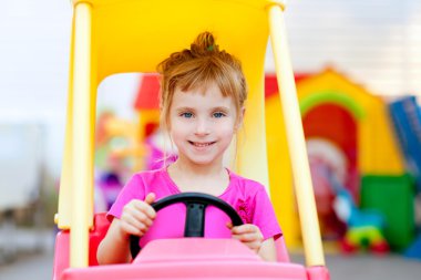 Blond children girl driving toy car clipart