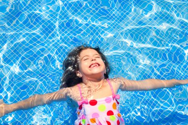 Brunette children girl swimming blue tiles pool clipart