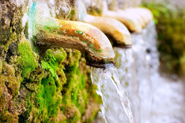 Brass fountain water source spring — Stock Photo, Image