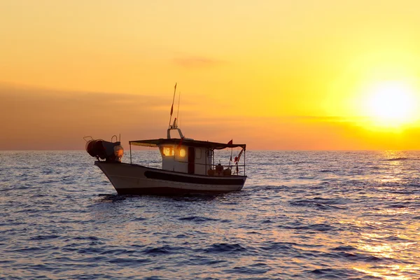Fishing boat in sunrise at Mediterranean sea — Stock Photo, Image