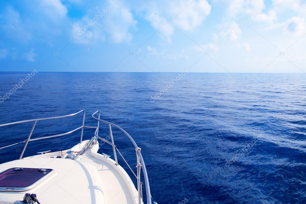 Boat bow sailing in blue Mediterranean sea